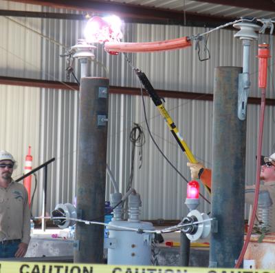 Mike Proske and Mason Saleman demonstrate the dangers of electricity